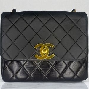 CHANEL Black Quilted Flap 24K Gold CC Logo Leather Shoulder Bag